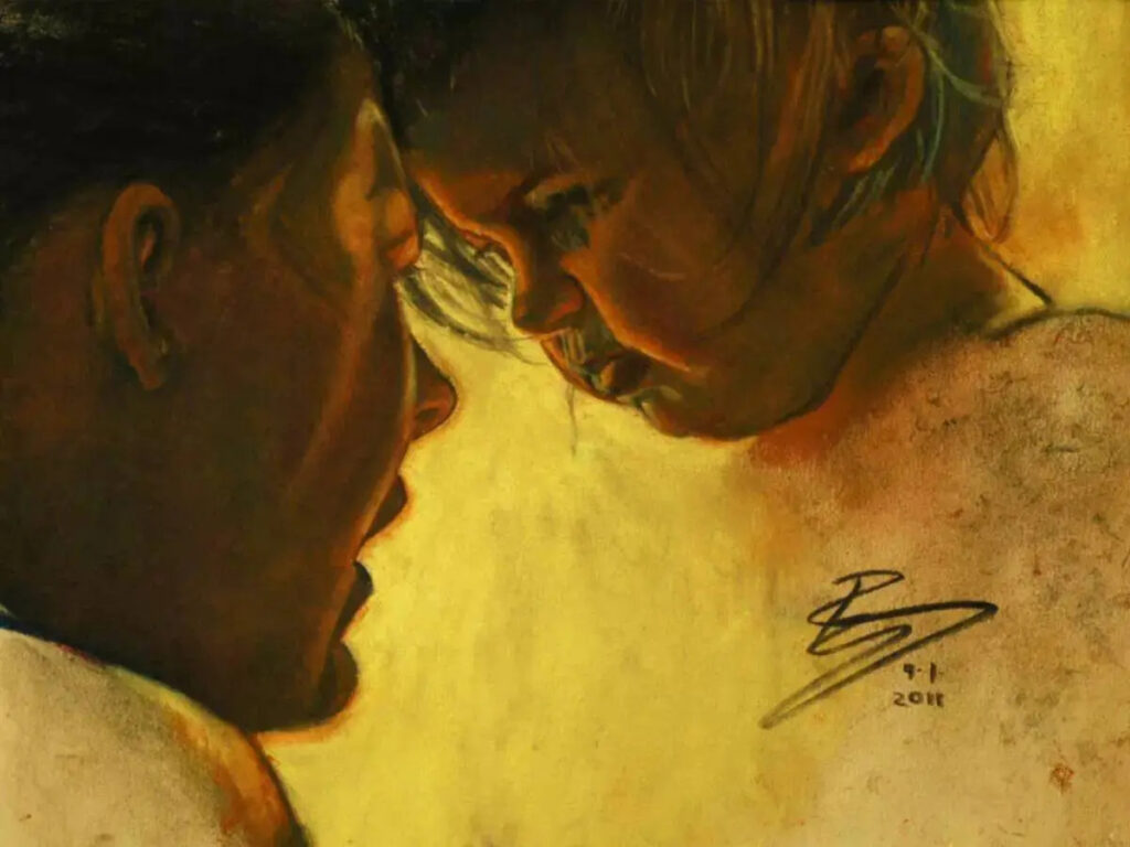 Two faces close together, sharing an intimate moment.