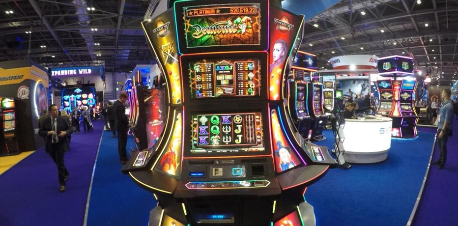 Casino slot machines at a gaming expo.