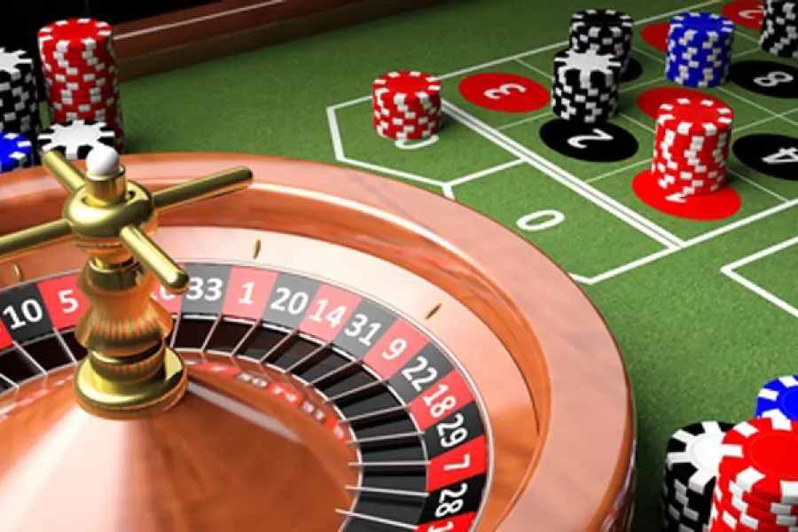 Roulette wheel with colorful casino chips